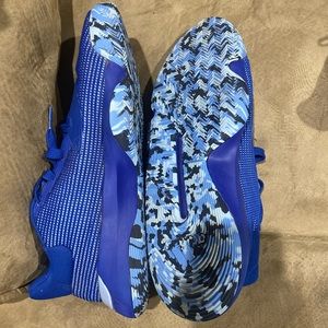 Size 14 mens blue adidas basketball shoes.  Never worn.